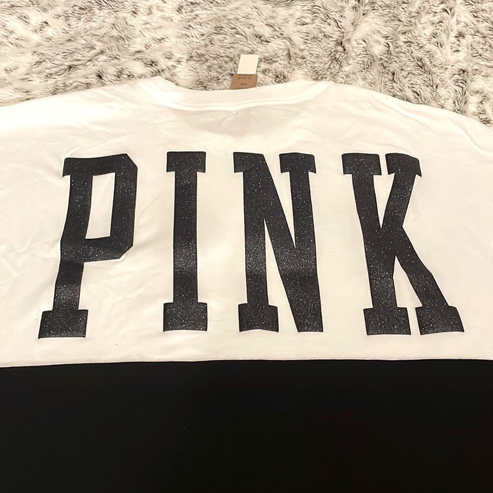 Victoria Secret oversized, size medium, black and white T-Shirt.